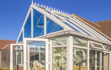 conservatory roof insulation costs Queens Park